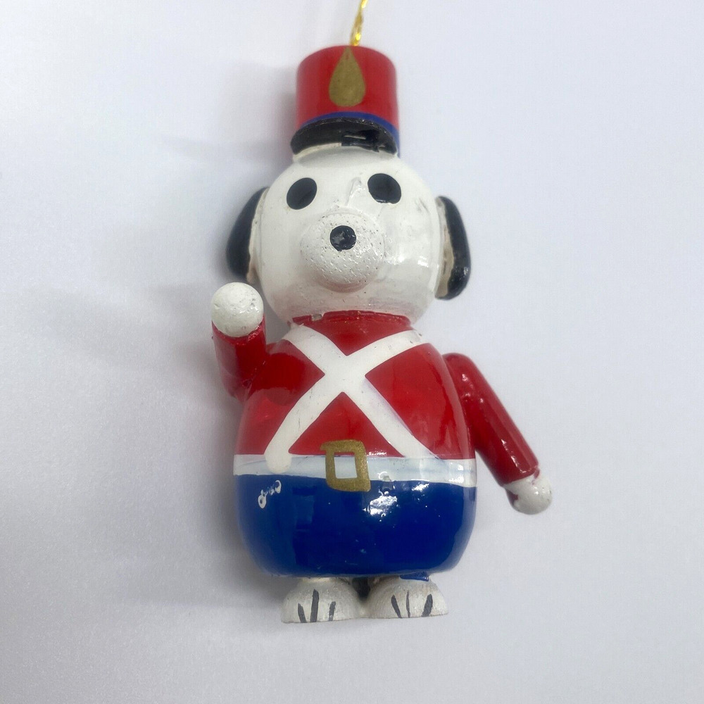 Wood Dog Soldier Ornament Painted White Black Ears Red Shirt Blue Pants 3 inches